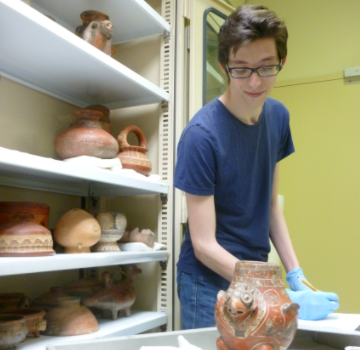Student with pottery