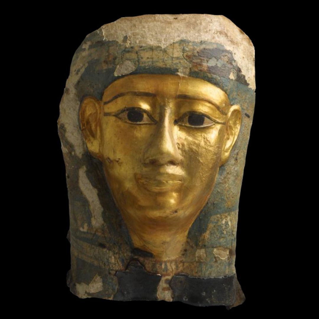 Image of an Egyptian mummy mask on a black background