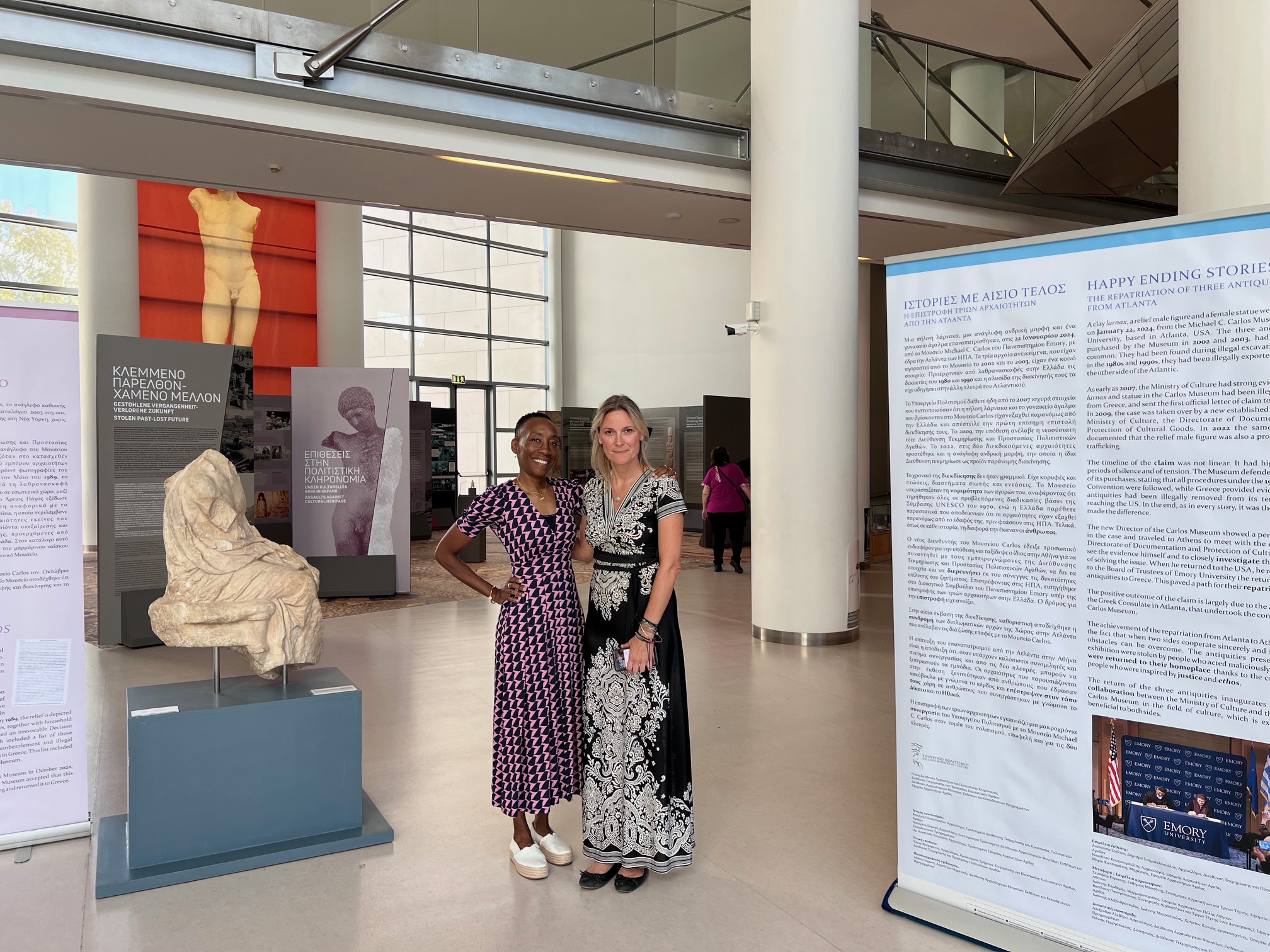 eorgia Manolopoulou of the Hellenic Ministry of Culture and Valeda Dent, Vice Provost of Emory Libraries and Museum in the exhibition at the Archaeological Museum of Patras with the returned objects