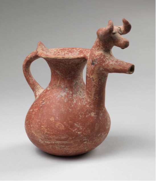 Red-ware vessel with handle shown on a gray background