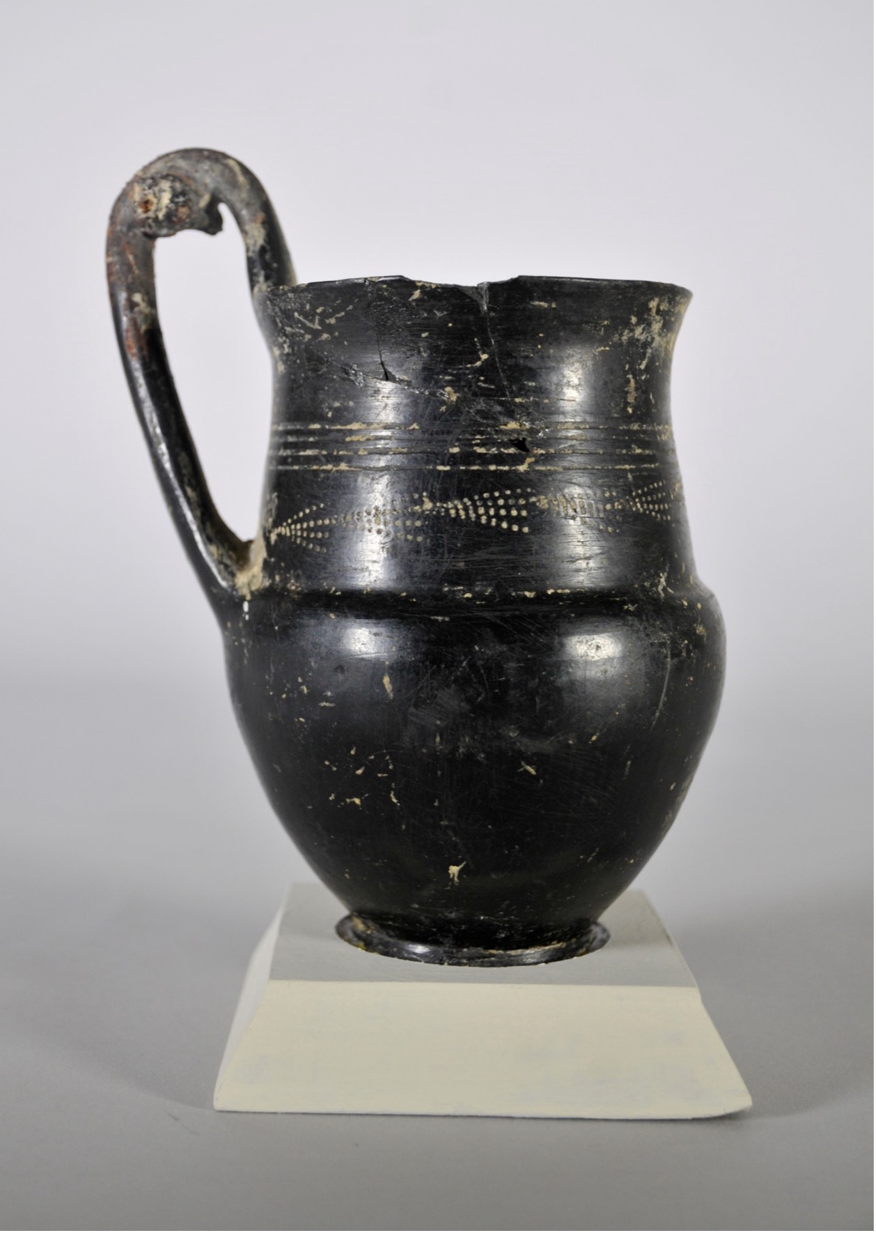 Bucchero Jug.  Etruscan.  6th Century BCE.  Ceramic.  Loaned by the Italian Republic/Concesso in prestito dalla Repubblica Italiana.  L2024.052.001.