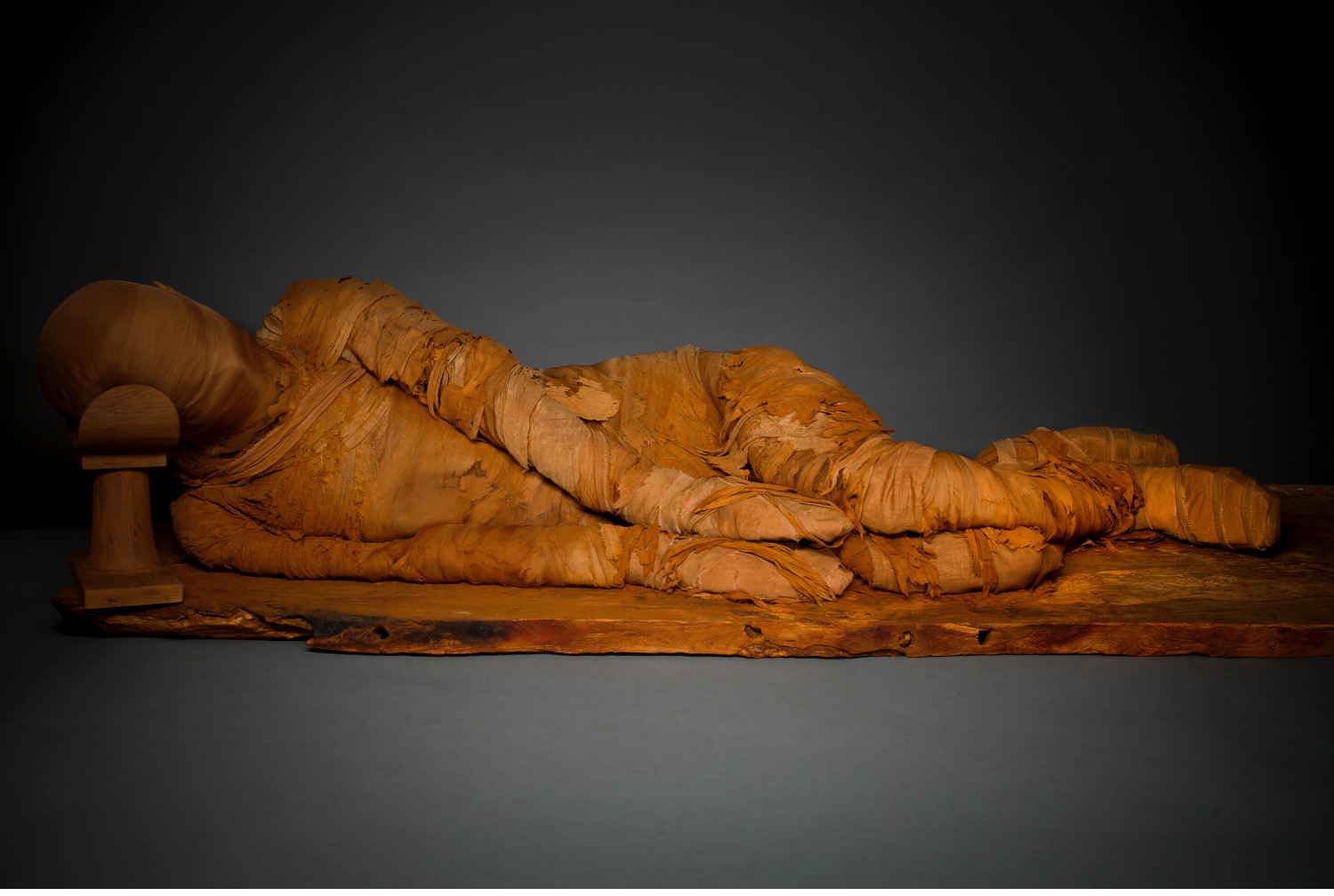  Mummy and Coffin base, Old Kingdom, Dynasty 6