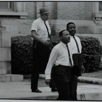 Black and white photograph of Dr. Martin Luther King, Jr. and Reverend Ralph Abernathy, 1962 by Danny Lyon
