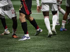 Sheila Pree Bright Photography of players feet and legs playing soccer
