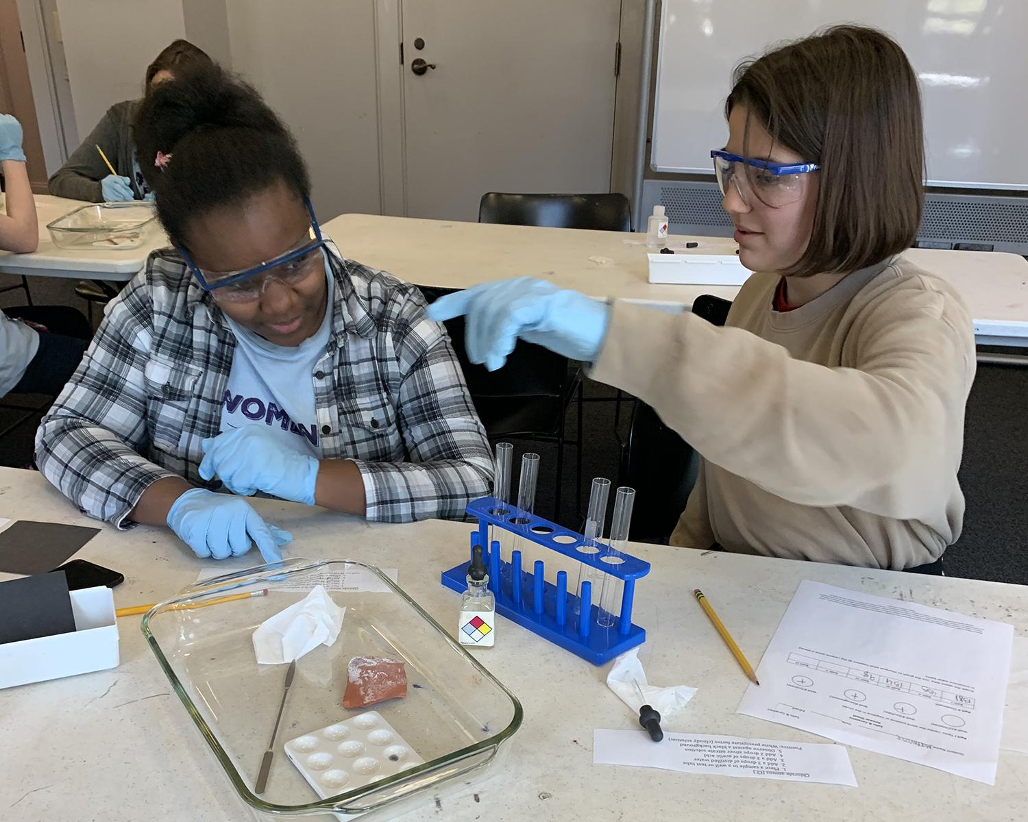 children working on a science project