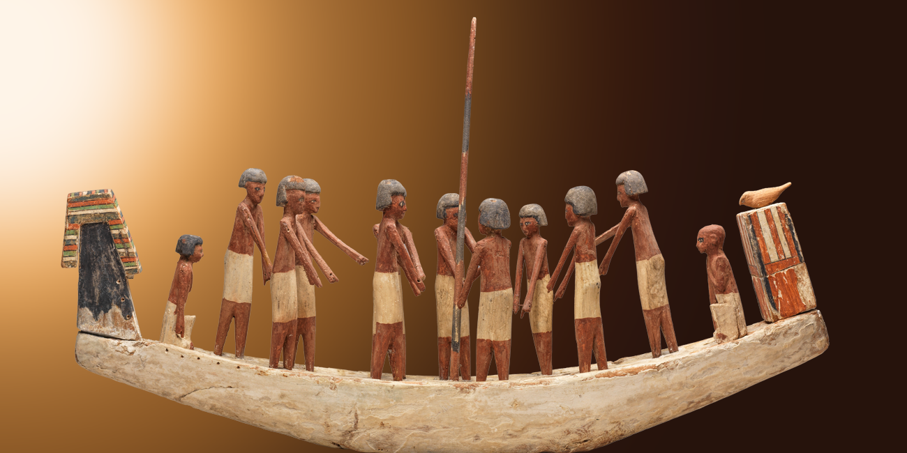 Photo: Primitive Egyptial boat with passengers