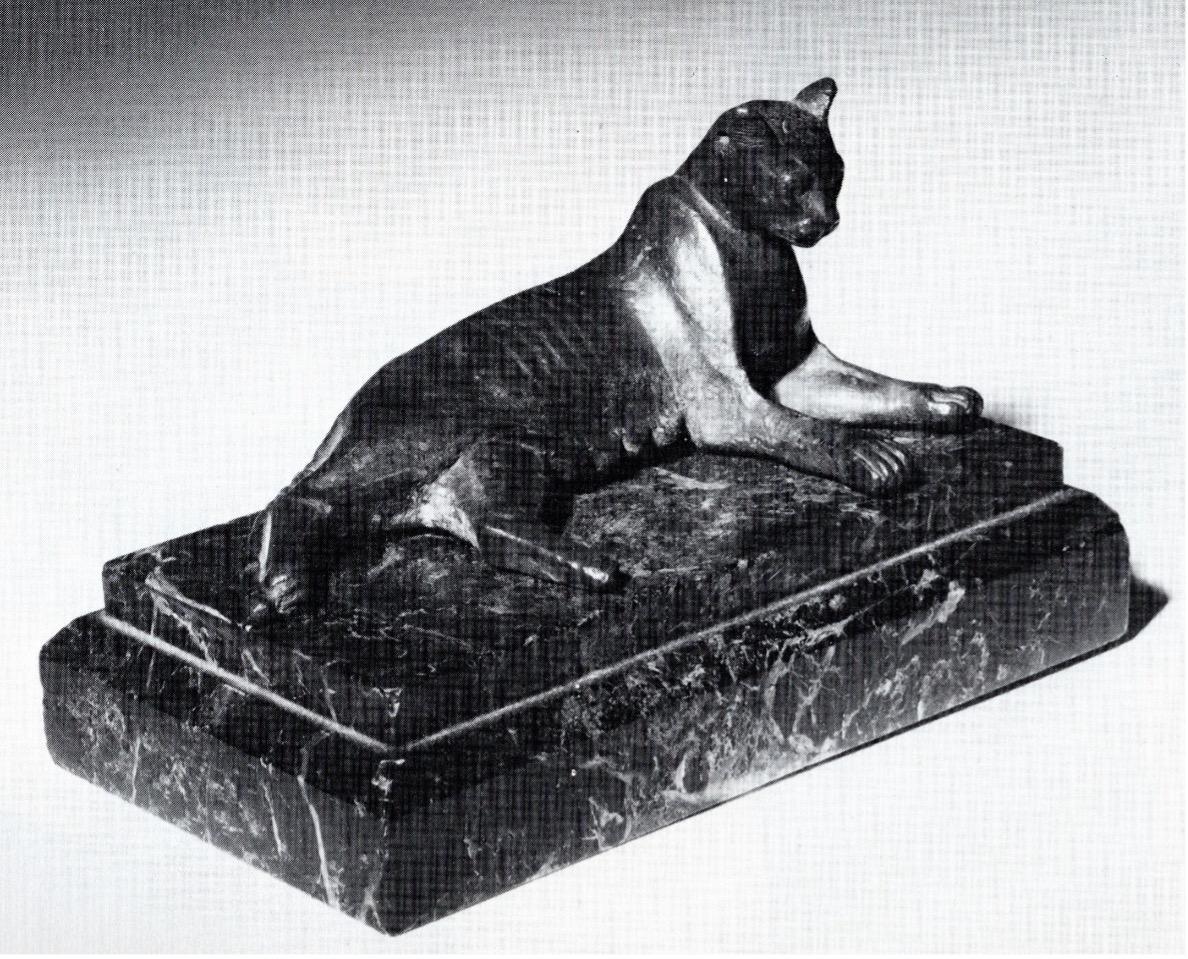 Black and white photo of a reclining cat statuette offered by Rupert Wace in Fall 2025